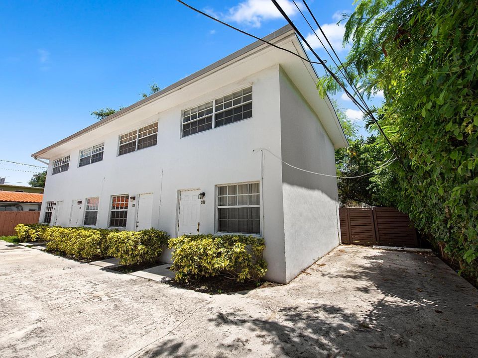 Front of the townhouse with side private parking