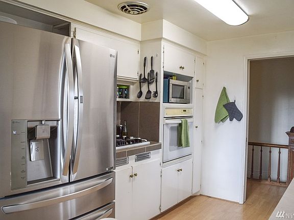 Original Cabinetry Lots of potential to be creative Newer 5 door Refrig
