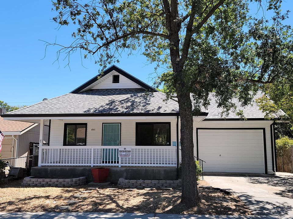 White & black paint, & decorative colored door! Such a cute home for you! Security door allows you to confidently keep your front door open for those spring & fall breezes! Notice the large railed front porch - a very desired & loved space