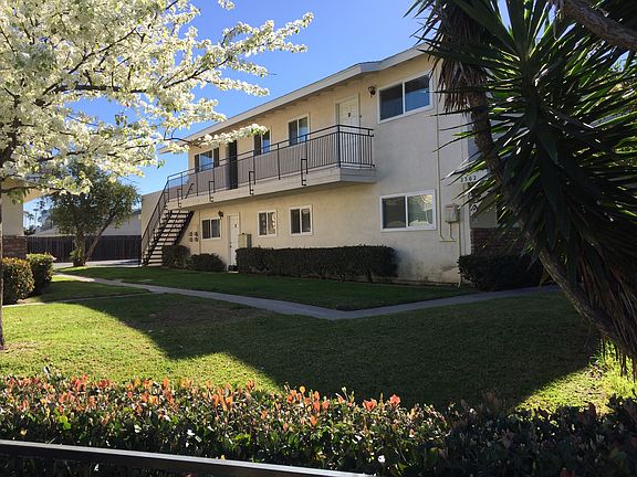 Front of apartment building at end of street near cul--de-sa
