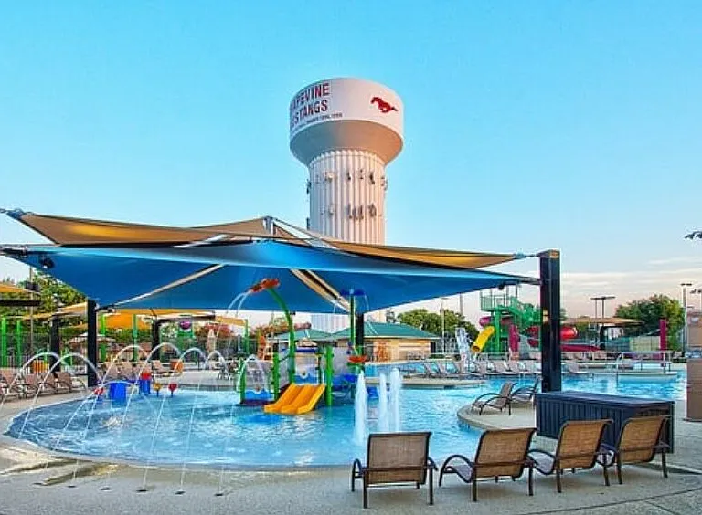Dove Park offers something for everyone, including Dove Waterpark with waterslides, a diving board, zero-depth entry, sprayground, and concession stand. Daily admission is approximately $3 for Grapevine residents!