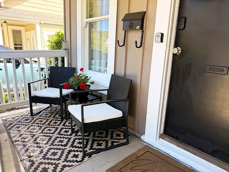 Private front porch area is the perfect place to sip your morning coffee
