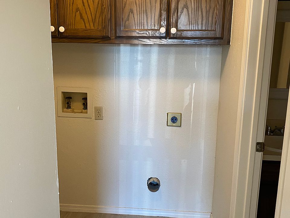 Room for full-size washer/dryer and lots of storage.