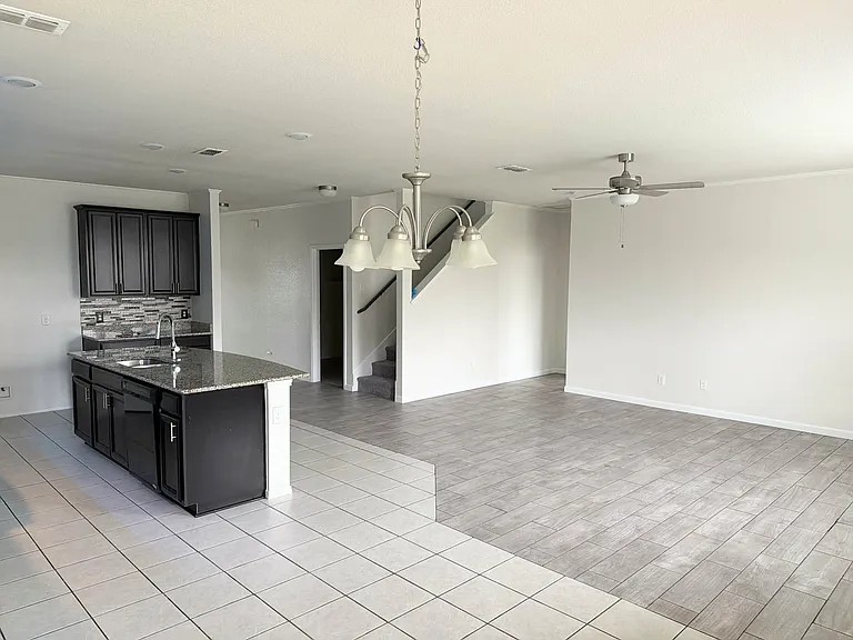 Kitchen, breakfast nook, and living room
Open concept