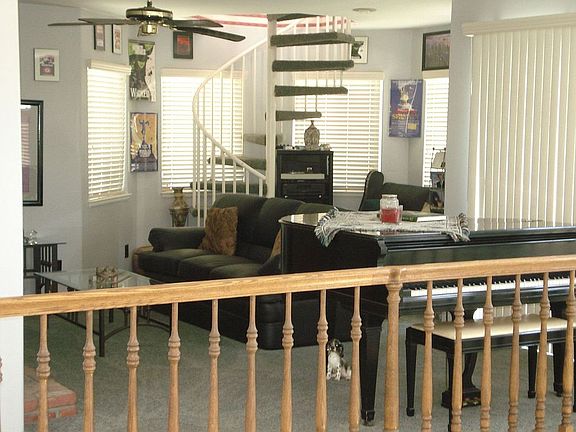 Loft living area -spiral stairs to turret