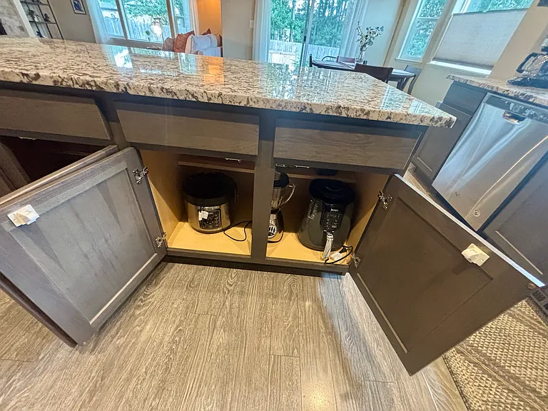 Kitchen is fully stocked with all supplies, utensils, and small appliances