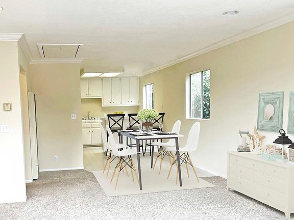 Dining room and kitchen seating area.