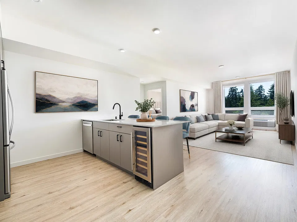Premium homes feature oversized kitchen islands, built-in wine refrigerators, quartz countertops, and spacious open-concept layouts designed for elevated living and entertaining.