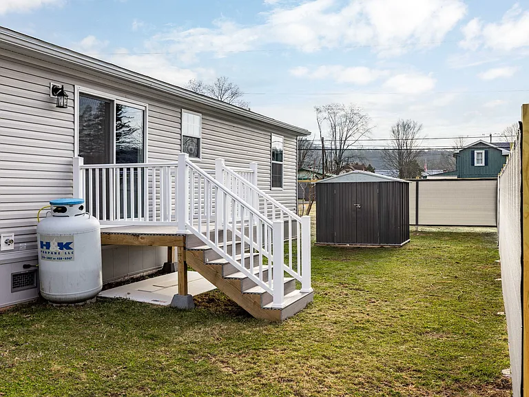 Back deck with private backyard
