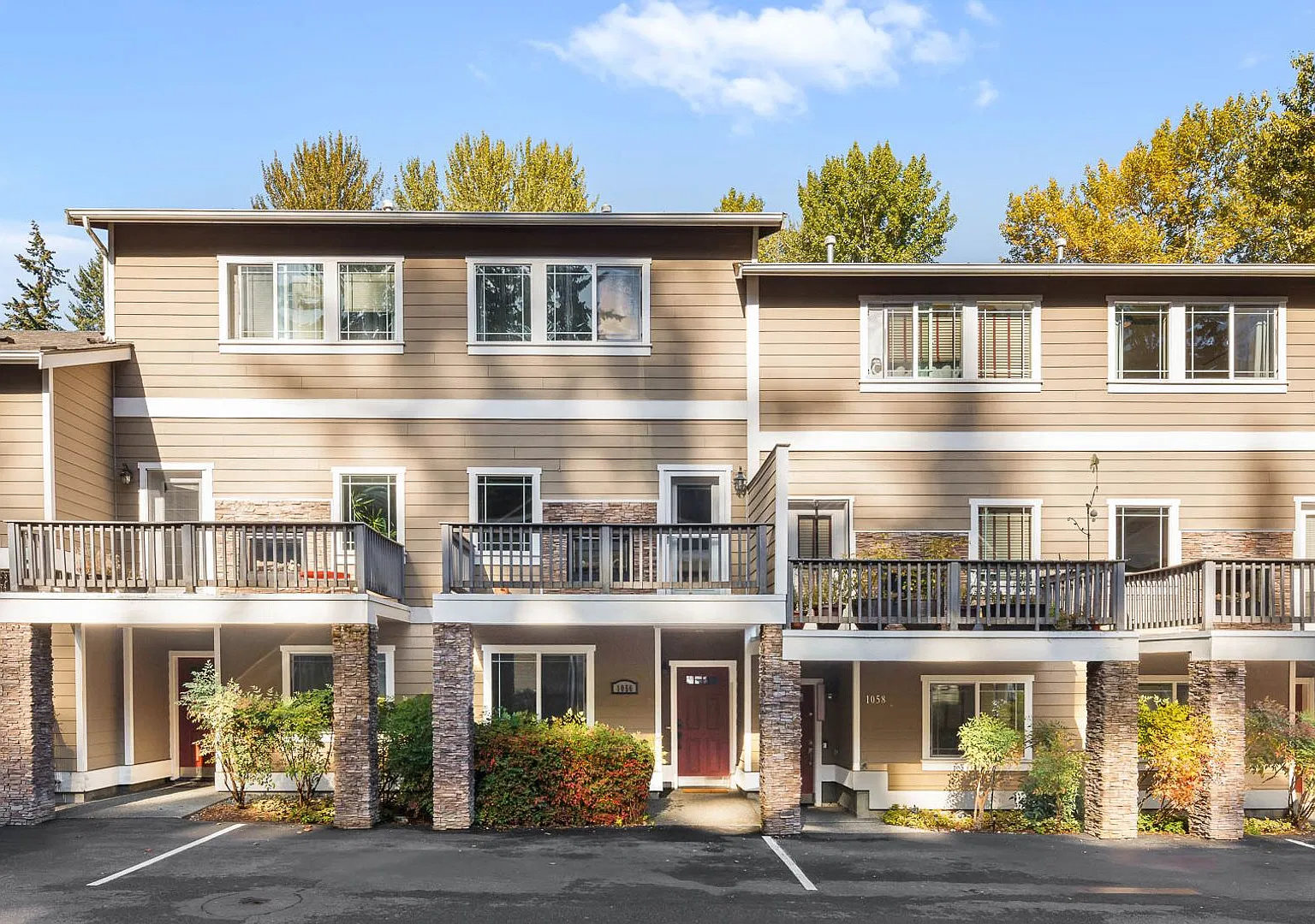 Private Gated 3 Bedroom Townhome with Greenbelt Views, Den & Two-Car Garage! — Photo 1