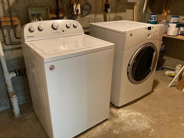 Utility room in basement for washer and dryer