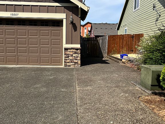 Side of house additional parking.
