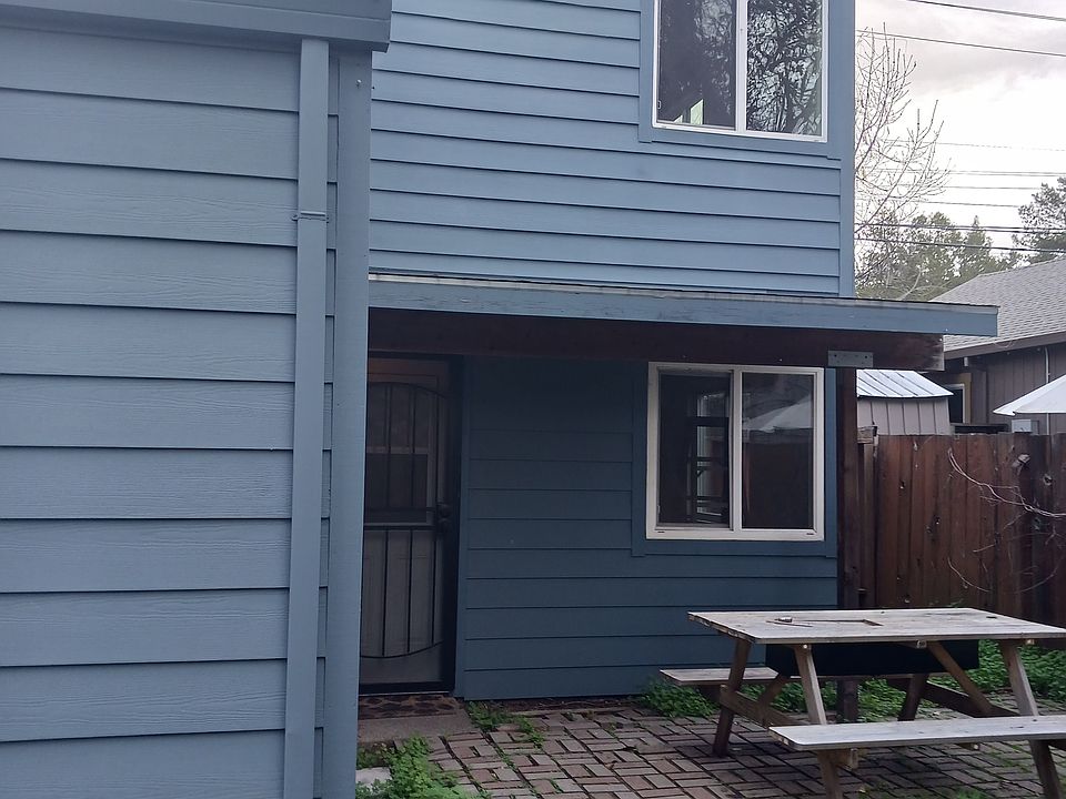 Back patio area, partial view of yard