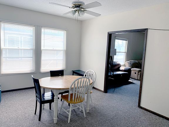 The Dining Room is located between the Living Room and Kitchen.