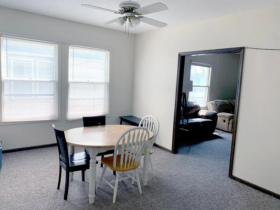 The Dining Room is located between the Living Room and Kitchen.