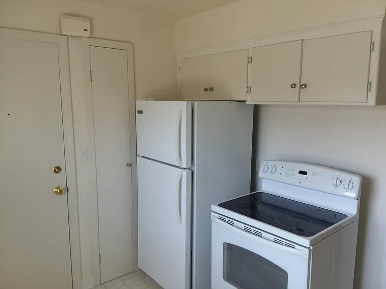 Kitchen with Stove and Refrigerator