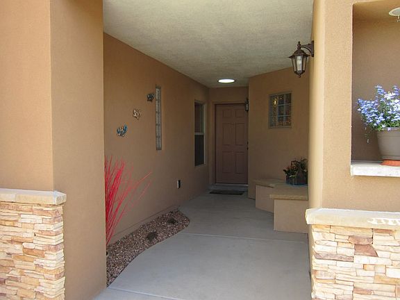 Recessed entry provides a private, shady front porch.