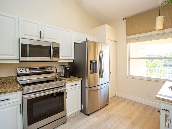 4th image of 6496 Huntington Lakes Cir APT 203