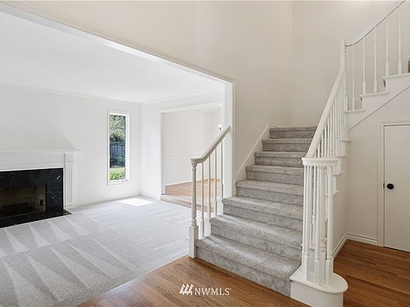 Once inside the 2-story foyer showcases refinished hardwood floors(2021) new carpet(2021) and new interior paint throughout the home!