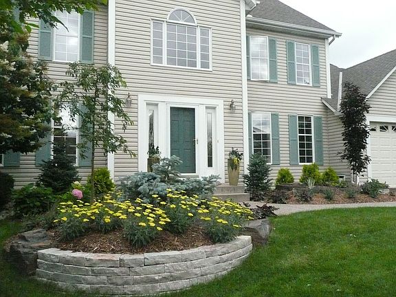 Professional landscaping in front yard