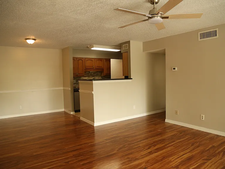 Living room leading to en suite bedroom