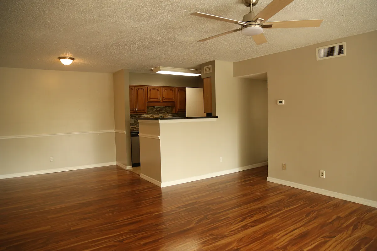 Photo 2 of 12 - 13383 Arbor Pointe Cir #202 - Tampa, FL Living room leading to en suite bedroom - 13383 Arbor Pointe Cir #202