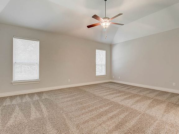 Unwind after a long day in the private master suite