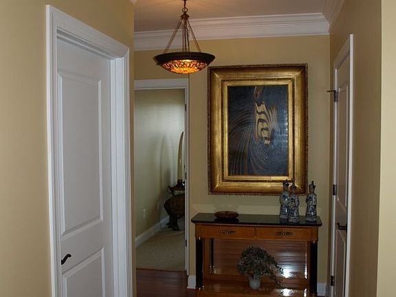 Fine entry hall. Glowing wood floors.