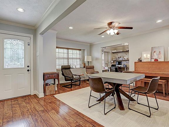 Reverse view of the entry. Dining room also opens into a study/office, currently being used as a craft room.