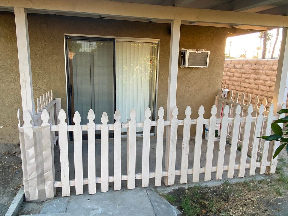 The entry is in the back of the property.