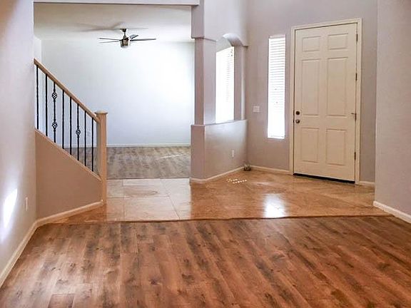 Front entry dining room looking into living room. All new fans.