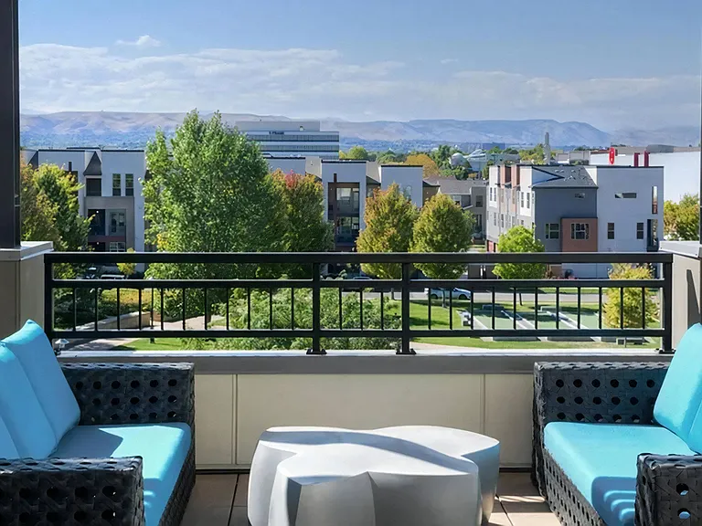 Sky Lounge with Comfortable Seating and Expansive Mountain Views