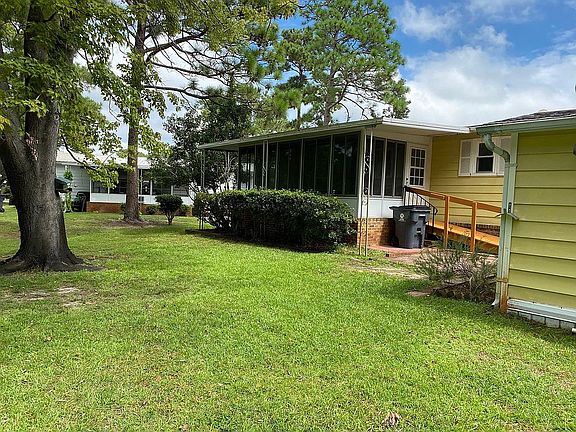 Rear of home & part of yard