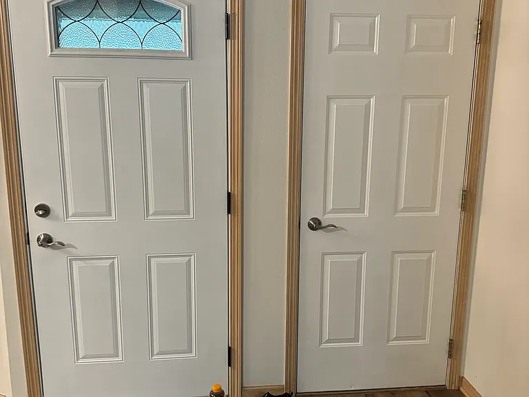Front entry on left and garage entry on right
