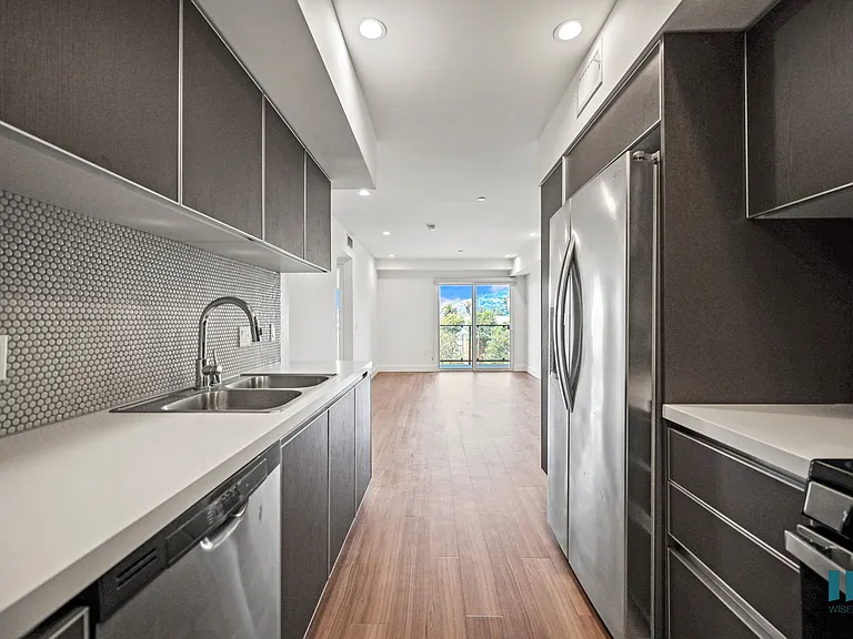 Kitchen with Energy-Efficient Appliances and Ample Cabinet Storage