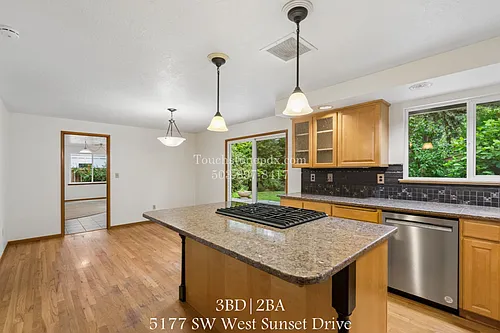 5177 SW West Sunset Dr Photo 1
