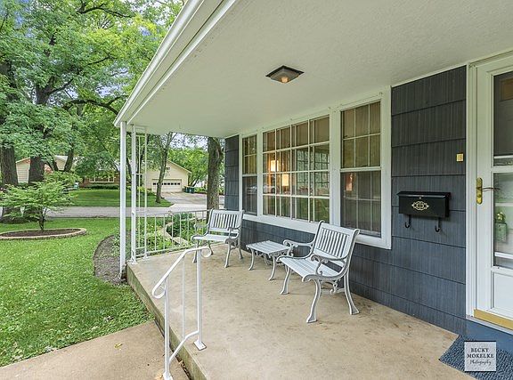 You'll enjoy time spent on this charming covered porch!