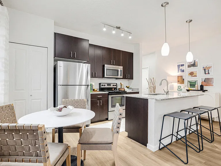 Granite countertops and stainless steel Whirlpool® appliances