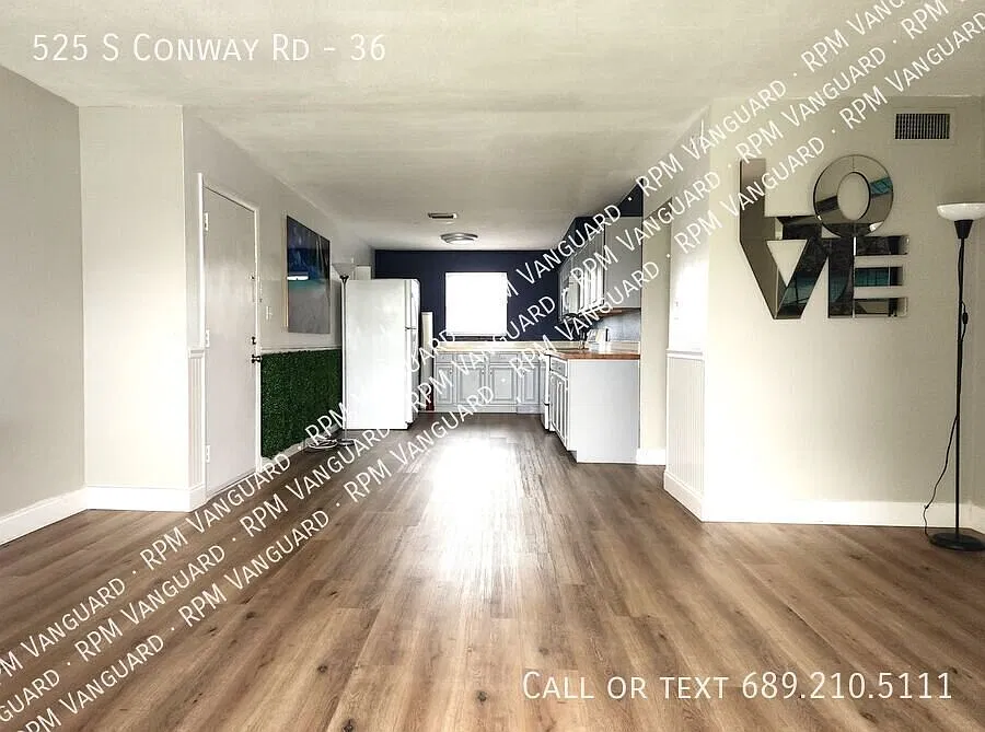 Second Floor Condo Unit with Balcony and Pool View — Photo 3