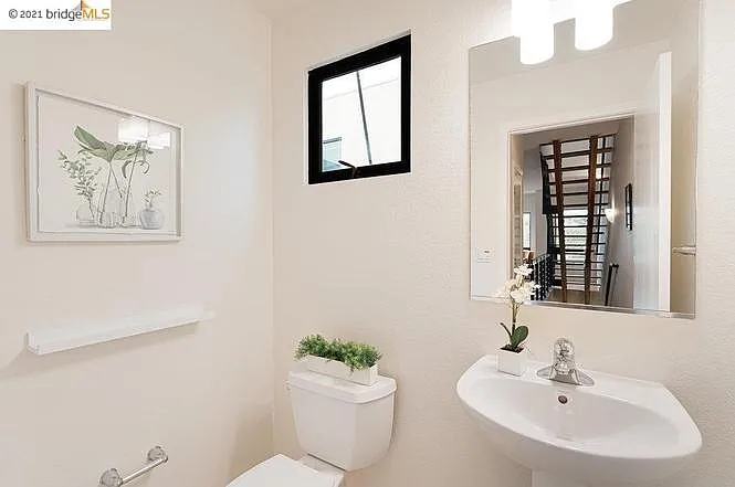 Half bath on second floor (living room/kitchen)