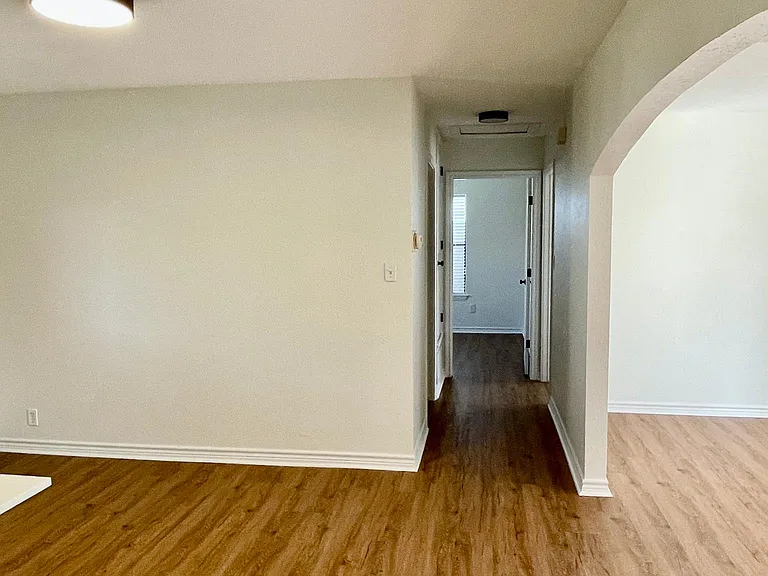 Hallway to bathroom and bedrooms