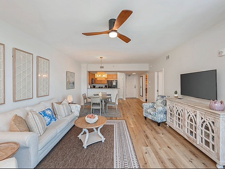 This gorgeous condo has an open floorplan with modern furnishings and all appliances in the unit including fridge, stove, microwave, dishwasher, washer & dryer
