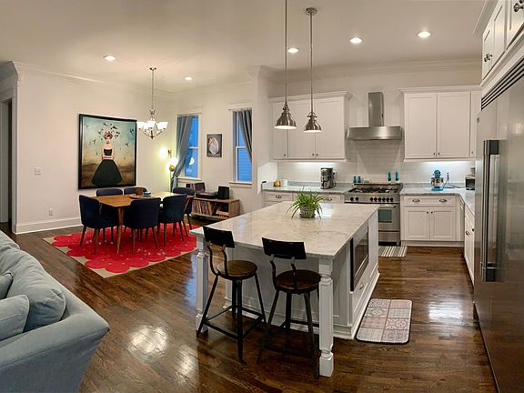 Open concept kitchen and dining.