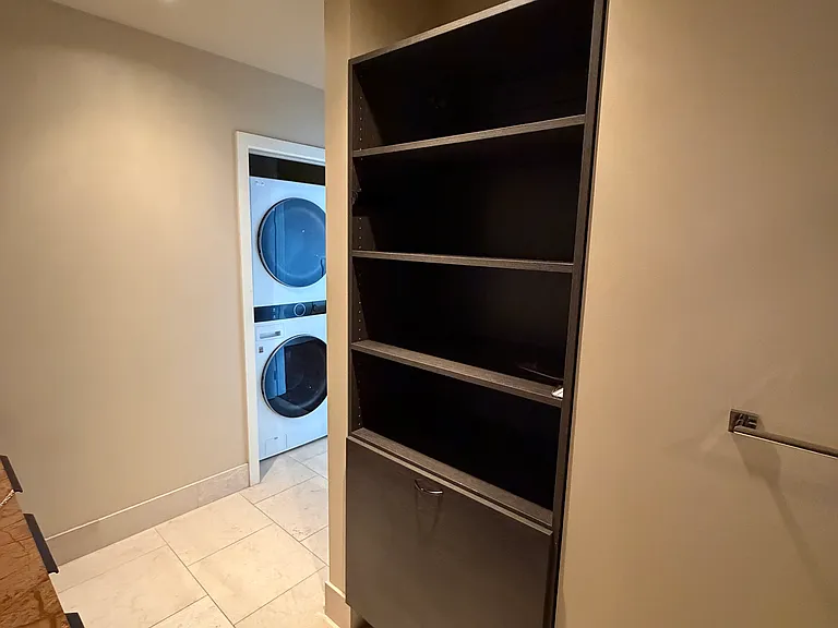 new washer/dryer. California closets built-in with laundry hampers.