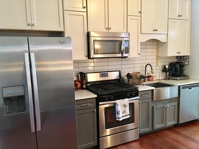 New Kitchen - floor to ceiling cabinets. All stainless steel