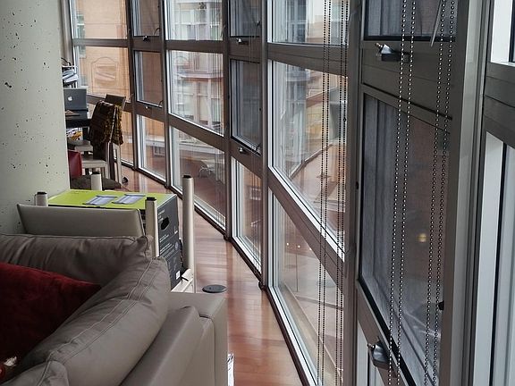 30-foot wall of curved glass with southwestern exposure