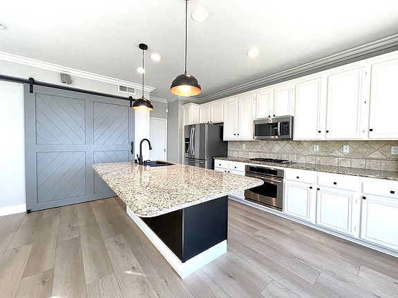 Kitchen + Custom Barn Door Pantry