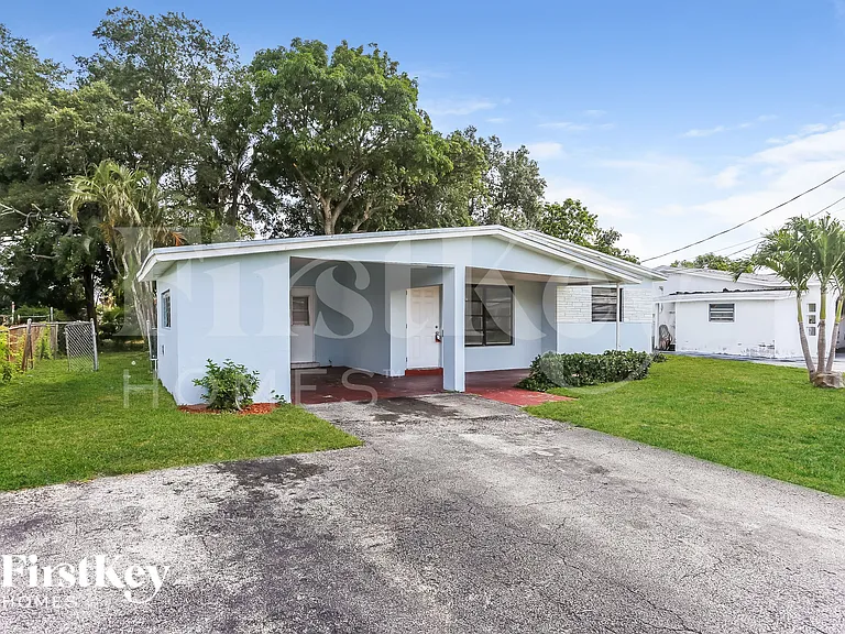 3751 NW 9th Ct — Photo 2