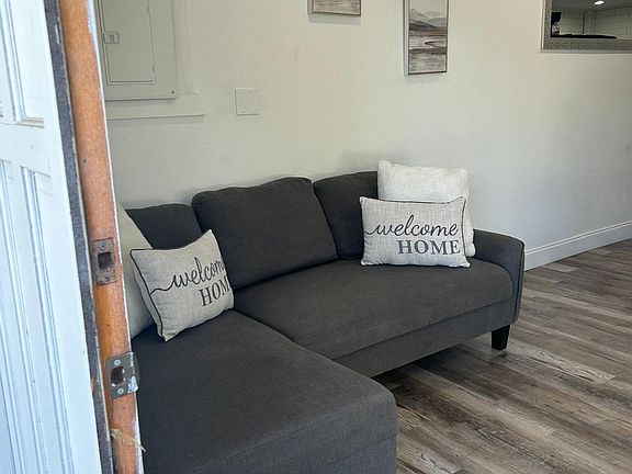 Spacious Sofa with Stylish Decorative Pillows for Ultimate Comfort
