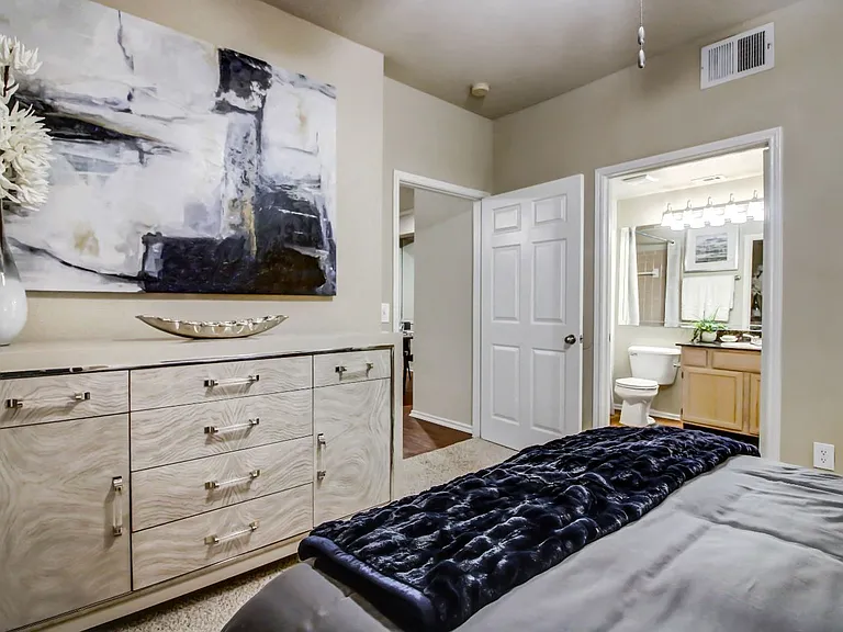 Spacious bedrooms with large windows for natural lighting, ceiling fan and plush carpet